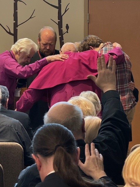7-then_bishop_rich_lipka_and_bishop_bill_ilgenfritz_(the_mdas’s_first_bishop)_laid_hands_on_and_prayed_over_them.